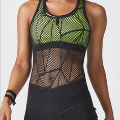 Brand New, Never Worn. Fits S/M, But Very Stretchy. Green Mesh Activewear For Workout, Green Racerback Athletic Fit Top, Green Athletic Fit Racerback Top, Green Racerback Breathable Top, Green Breathable Racerback Top, Green Sporty Tops With Seamless Construction, Green Sporty Seamless Tops, Green Athleisure Activewear With Mesh Back, Black Compression Top With Mesh Back