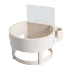 a white toilet paper holder with a card slot on the front and back of it