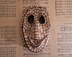 a mask is made out of sheet music