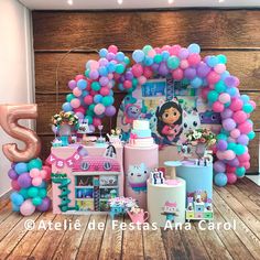 a birthday party with balloons and decorations