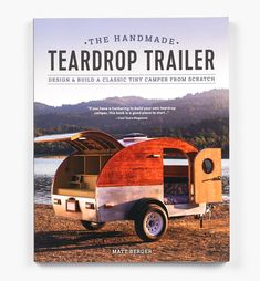 the handmade teardrop trailer book is on display