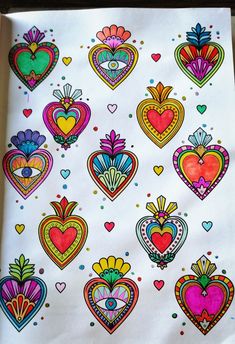 an image of colorful hearts on white paper