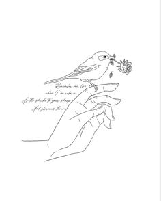 a drawing of a bird holding a flower in it's beak with writing on the side