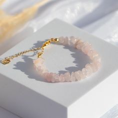 Discover our beautiful handmade rose quartz bracelet! Made from high quality rose quartz nuggets, this bracelet is not only an elegant piece of jewelry but also a symbol of love, compassion and peace. Perfect for everyday use or as a gift for someone special. Enjoy the beauty and positive energies of this stunning rose quartz bracelet! Meaning of rose quartz gemstone: Rose quartz is referred to as the stone of love and is revered by the heart. The Greeks and Romans believed that rose quartz was brought by the gods Eros and Amor. It is said that the stone can increase sensitivity, empathy, the ability to love, heart strength and romance. Length: 6 - 8,3 Inch ---DETAILS--- -Rose quartz bracelet -18k high quality gold plated heart -Rose Quartz gemstones - Bracelet gemstone -Adjustable bracele Girlfriend Jewelry Gift, Nugget Bracelet, The Greeks, Bracelets With Meaning, Handmade Rose, Rose Quartz Bracelet, Natural Stone Bracelets, Rose Quartz Gemstone, Quartz Rose