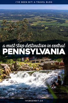 a person sitting on top of a rock next to a river with the words, a must - stop destination in central pennsylvania