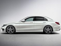 the mercedes c - class sedan is shown with its rear lights on and side view