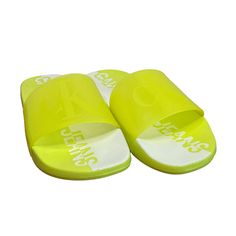 Men's Aerlin Pool Slide Sandals From Calvin Klein. Casual And Cool, These Slides Are A Wardrobe Essential. The Transparent Polyvinyl Chloride Upper Is Embossed With A Oversized Ck Monogram Logo And The Contoured Footbed Features A Printed Calvin Klein Jeans Logo. Round Toe. Slip On. Manmade Upper And Sole. Color Yellow Size 12 Brand New Without Box! Retail $49.00 Calvin Klein Sandals, Ck Monogram, Logo Flip Flops, Pool Slide, Grey Sandals, Mens Shoes Sandals, Brown Leather Shoes, Jeans Logo, Calvin Klein Shoes