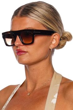 These transparent sunglasses have a square acetate design with metal 'T' logo temple decoration. 100% UV protection Solid lenses Acetate/polycarbonate Made in Italy Tom Ford Sunglasses 2022, Trendy Triacetate Sunglasses With Polarized Lenses, Trendy Sunglasses With Polarized Lenses, Luxury Tan Sunglasses With Mirrored Lenses, Modern Tan Sunglasses With Gradient Lenses, Trendy Tan Sunglasses With Gradient Lenses, Temple Decoration, Transparent Sunglasses, Acetate Sunglasses