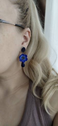 Blue Flower Charm Drop Earrings, Blue Flower Earrings With Ear Wire For Party, Elegant Blue Flower Charm Earrings, Elegant Blue Drop Earrings With Flower Charm, Blue Drop Earrings With Flower Charm, Blue Drop Flower Earrings, Blue Drop Flower Earrings With Ear Wire, Blue Dangle Flower Earrings For Party, Blue Flower Charm Earrings