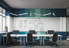 a conference room with chairs and a whiteboard