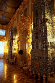 an ornate room with gold and black decor