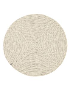 a white round rug on a white background