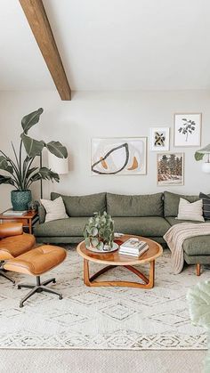 a living room filled with furniture and plants