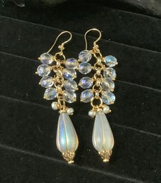 "Sparkling bohemian glam earrings are perfect for everyday or a special occasion. They feature beautiful Czech drop beads with a bit of an AB finish. The fire polished Czech crystal beads are  hand wire wrapped and cascade down these beautiful earrings.  Approximately 3.5\" long These earrings look amazing dressed up or worn with jeans and a t-shirt.  Each of my pieces are creatively put together with unique color, bead and metal combinations. Note! Colors may vary on different computer monitors and in different lighting conditions.  Please contact me with any questions or custom orders! Xo Hayley" Bohemian Glam, Glam Earrings, Handmade Chandelier, Gold Dangle Earrings, Handmade Earrings Beaded, Czech Crystal, Drop Beads, Gold Earrings Dangle, Computer Monitors