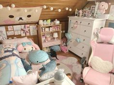 a child's bedroom decorated in pastel colors