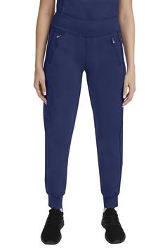 PRICES MAY VARY. CONTEMPORARY DESIGN: Our 9233 Tara Jogger Scrubs pant with 6 Pockets including 2 Zipper Pockets features a contemporary Jogger ankle style and high-performance yoga knit comfort stretch waistband. Inseam Measurements (based on size small): Regular (29), Petites (27"), Tall (31.5") THE WORLD'S BEST FABRIC: Purple Label collection for Women's Scrubs comprises a superior polyester-rayon-spandex stretch fabric blend that is lightweight, soft, and breathable. The Women Scrub Pants ar Types Of Pockets, Jogger Scrubs, Scrubs For Women, Parker Outfit, Healing Hands Scrubs, Lab Coats, Alegria Shoes, Healing Hands, Fashion Mask