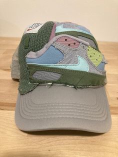 Handcrafted with 50% recycled material. Golf course Max 1s. One size fits all. Functional Green Snapback Hats, Functional Green Hats For Streetwear, Breathable Hat With Curved Visor For Spring, Functional Green Hat With Curved Brim, Spring Hat With Breathable Curved Visor, Spring Breathable Hat With Curved Visor, Green Sporty Visor Hat, Sporty Green Visor Hat, Casual Golf Trucker Hat With Curved Brim