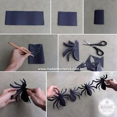 an image of someone cutting out paper spiders on the wall with scissors and glue