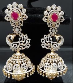 18 Karat Gold '4 in 1' Detachable Diamond Jhumkas - Diamond Dangle Earrings with Color Stones & Pearls
  This product has Inter Changeable Red & Green color Stones in the Earrings 
    Note: Only front side has Diamonds as shown in the picture, the back part of the Jhumka which is not visible from the front is only Gold without Diamonds - 1-BG-DER-TP10547 - in 41.940 Grams for USD $6008.37. 
Made in India by Totaram Jewelers Online this product is in Gold - 18 Karat Gold  & is an exc Traditional Diamond Earrings With Latkans, Traditional Diamond Bridal Earrings For Festivals, Traditional Diamond Bridal Earrings For Reception, Diamond Earrings With Latkans For Diwali, Fusion Style Diamond Jhumkas For Festivals, Fusion Style Hand Set American Diamond Jhumkas, Traditional Diamond Jhumkas With Latkans, Diamond Temple Jewelry Bridal Earrings, Diamond Bridal Earrings For Diwali