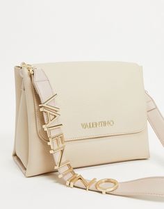 Bolso bandolera de Valentino by Mario Valentino Tu nuevo compinche Correa para el hombro de quita y pon Solapa en la parte superior Cierre con botón de presión Cierre de cremallera en la parte superior Bolsillos interiores con cremallera Nombre de la marca Herrajes en tono dorado Valentino Small Bag, Valentino Shoulder Bag, Crossbody Bag Valentino, Valentino Rockstud Mini Crossbody Bag, Valentino Bag Farfetch, Valentino Bag, Mario Valentino, Valentino Women, White Belt