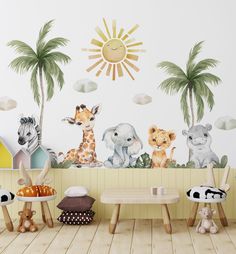 the children's room is decorated with animals and palm trees