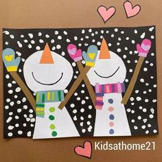 two paper snowmen with hats and scarfs