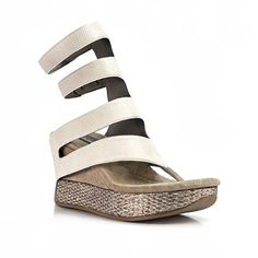 How to reverse upper: Click Here Step into contemporary elegance with the Modzori Corona Sandals, a perfect blend of modern design and versatile functionality. These high-wedge, reversible sandals are crafted with meticulous attention to detail, ensuring both style and comfort. The Corona Sandals feature a soft and stretchy upper with bold, asymmetrical cutouts that add a touch of sophistication to your look. The adjustable straps on Velcro bases provide a customized fit, enhancing both comfort Modern Wedge Sandals With Arch Support For Spring, Modern Beach Wedge Sandals With Single Toe Strap, Modern Adjustable Wedge Sandals With Removable Insole, Modern Silver Platform Wedge Sandals, Convertible Shoes, High Wedges, Mix N Match, Black Sandals, Snug Fit