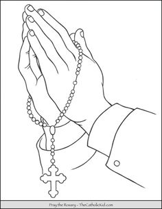 the hands of a person holding a rosary