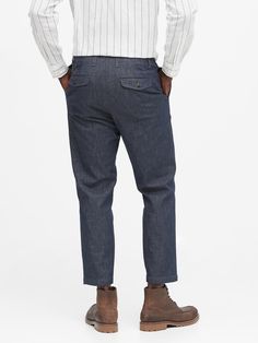 A sleek officer's pant in our relaxed, Trooper fit, beautifully crafted in a soft, stretch-cotton chambray from an Italian mill.  Button fly.  Belt loops.  On-seam pockets.  Rear buttoned flap pockets.  Unlined.  Produced in a facility that runs P. A Denim Blue Tapered Leg Cargo Pants, Relaxed Fit Chinos With Cropped Leg And Welt Pockets, Casual Denim Blue Pants With Button Closure, Casual Workwear Jeans With Patch Pockets, Casual Jeans With Patch Pockets For Work, Mid-rise Relaxed Fit Chinos With Belt Loops, Relaxed Fit Cropped Chinos With Pockets, Chino Cotton Twill Jeans For Fall, Denim Blue Tapered Leg Pants With Patch Pockets