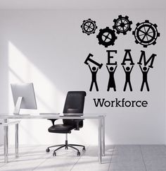 a wall decal with the words teamwork on it and people holding hands in front of them