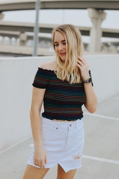 Rainbow striped, smocked crop top with sleeves. Maddie is wearing a size smallThis item is final sale. Striped Crop Top For Day Out, Striped Cropped Top For Day Out, Chic Striped Cropped Top, Chic Striped Cropped Crop Top, Trendy Striped Stretch Crop Top, Casual Striped Crop Top, Crop Top With Sleeves, Top With Sleeves, Boutique Gifts