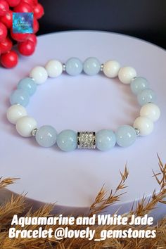 Beautiful, tender and feminine Aquamarine and White Jade bracelet, with an accent Cubic Zirconia bead. These natural sky blue and white pastel colors will enhance the look of any trendy lady and will transmit to their wearer its power and protection. #gemstonebracelet #blueandwhite #lightbluebracelet #aquamarine #giftforwife #birthdaygiftforher #giftforgirlfriend #aquabluebracelet #pastelcolorsbracelet #breadedbraceletwomen #whitestonebracelet #bluestonebracelet #giftforwomen Dark Blue Jewelry, Royal Blue Jewelry, Navy Blue Jewelry, Blue Stones Jewelry, Healing Gemstone Bracelets, White Pastel, Aquamarine Bracelet