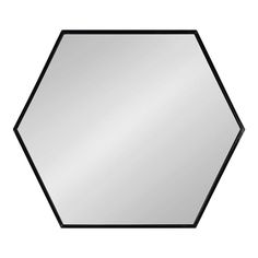 a black and white hexagonal mirror on a white background