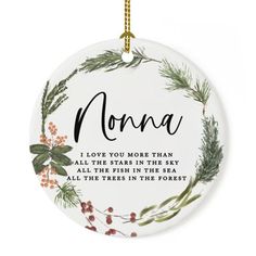 a white ceramic ornament with greenery on the front and words that read, grannys i love you more than all the stars in the sky