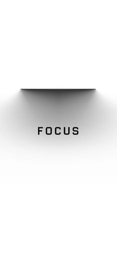 the word focus is shown in black and white with light coming from it's center