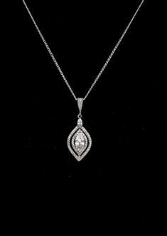 "Tarnish resistant rhodium silver plated metal framed marquise luxury AAA quality clear white cubic zirconia drop and bail with cubic zirconia deco. Comes with 16 or 18 inch sterling silver chain or 16-18\" adjustable rhodium silver plated brass chain. Pendant size with bail : 3.3cm x 1.4cm Matching earrings available and sold separately https://www.etsy.com/listing/618186130/bridal-jewelry-wedding-earrings?ref=shop_home_active_54&pro=1&frs=1" Bridal Jewelry Bracelets, Bridal Pendant, Engagement Necklaces, Necklace Bridal, Etsy Bridesmaid Gifts, Double Halo, Marquise Cut Diamond, Jewelry Bridal, Argentium Silver