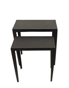 three black nesting tables with one end table on each side and the other half empty