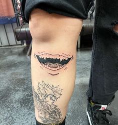 a person with some tattoos on their legs