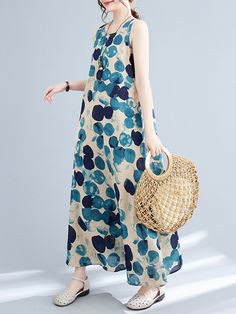 Loose Sleeveless Polka-dot Round-neck Maxi Dresses Casual Polka Dot Maxi Dress For Beach, Polka Dot Sleeveless Summer Sundress, Sleeveless Polka Dot Maxi Dress For Summer, Sleeveless Maxi Dress With Polka Dots For Summer, Polka Dot Sleeveless Dress For Summer Beach, Polka Dot Sleeveless Dress For Beach In Summer, Polka Dot Sleeveless Beach Dress For Summer, Polka Dot Sleeveless Sundress For Summer, Sleeveless Polka Dot Sundress