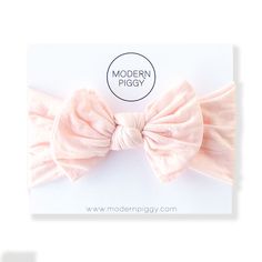 "Our baby bands are a wrap style bow made out of high quality nylon. Each bow measures approximately 4.5\" x 3\" on a stretchy nylon band that fits newborn to toddler. We look forward to seeing your sweet babe wearing #modernpiggy. **Our bows may contain small parts that could potentially be dangerous to small children. Please supervise your child while wearing our bows." Baby Band, Be Dangerous, Looking Forward To Seeing You, Pink Baby, How To Make Bows, Wrap Style, Baby Pink, Making Out, Hair Accessories