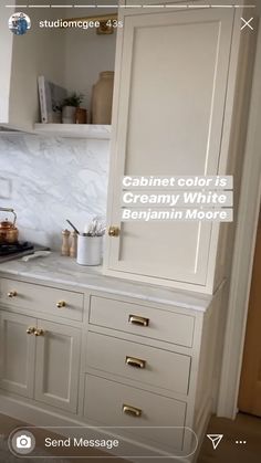 a kitchen with white cabinets and marble counter tops in the background is an email message that reads, cabinet color is creamy white pellamin moore