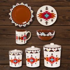 an assortment of native american dishes and cups