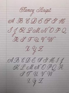 the writing is lined up with different types of cursive letters and numbers on it