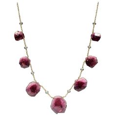 Pink tourmaline slice necklace, accented with 3.5 x 4 mm aquamarine beads. One of a kind made in 18k gold. 44.40 carats pink tourmaline. Length of necklaces 23 inches Tourmaline Briolette Jewelry With Natural Stones, Briolette Tourmaline Jewelry With Natural Stones, Tourmaline Briolette Gemstone Jewelry, Agate Slice Necklace, Black Tourmaline Necklace, Faceted Bead Necklace, Wooden Bead Necklaces, 18k Gold Necklace, Aquamarine Beads