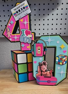 the number four has been made out of rubikt cubes and it's shaped like a pig