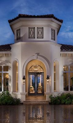 the front entrance to a home at night