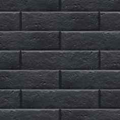 a black brick wall that is very dark