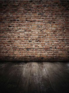 an old brick wall and wooden floor stock photo