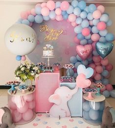 an elephant themed birthday party with balloons and decorations