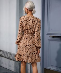 Our Labyrinth Dress comes in a stunning beige base featuring a leopard-inspired print. This relaxed mini features a V neckline with a tie detailing. The cinched puff long sleeves, elasticated waistband, and layered skirt with frill detailing are lovely additions to this mini. Size Guide: Melina is 5’6” tall, and has a 33.5” bust, 24.8”waist, & 37.4” hips. She is wearing a S / US 4 / AU 8. This dress is true to size. Material: 100% polyester Feature: Mini length. Relaxed fit. V neckline. Adjustab Chic Long Sleeve Leopard Print Mini Dress, Elegant Long Sleeve Leopard Print Mini Dress, Long Sleeve Leopard Print Mini Dress For Fall, Leopard Print Long Sleeve Mini Dress For Fall, Beige Ruched Mini Dress For Fall, Labyrinth Dress, Terrazzo Print, Long Sleeve Backless Dress, Casual Beach Dress